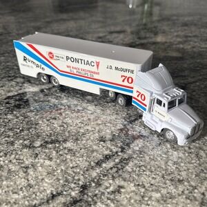 American Racing 1991 Scene #6 J. D. McDuffie Pontiac Mack Transporter Pontiac‎